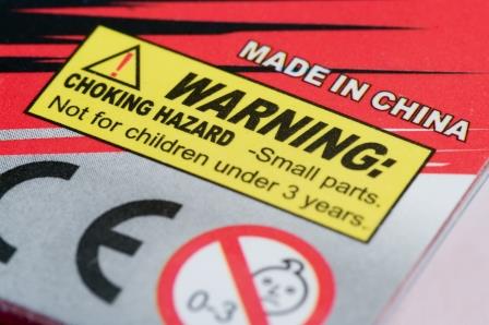 A product warning label that reads: 'WARNING: CHOKING HAZARD – Small parts. Not for children under 3 years.' Above the warning is the text 'MADE IN CHINA' and a symbol indicating the product is not suitable for children aged 0–3 years.