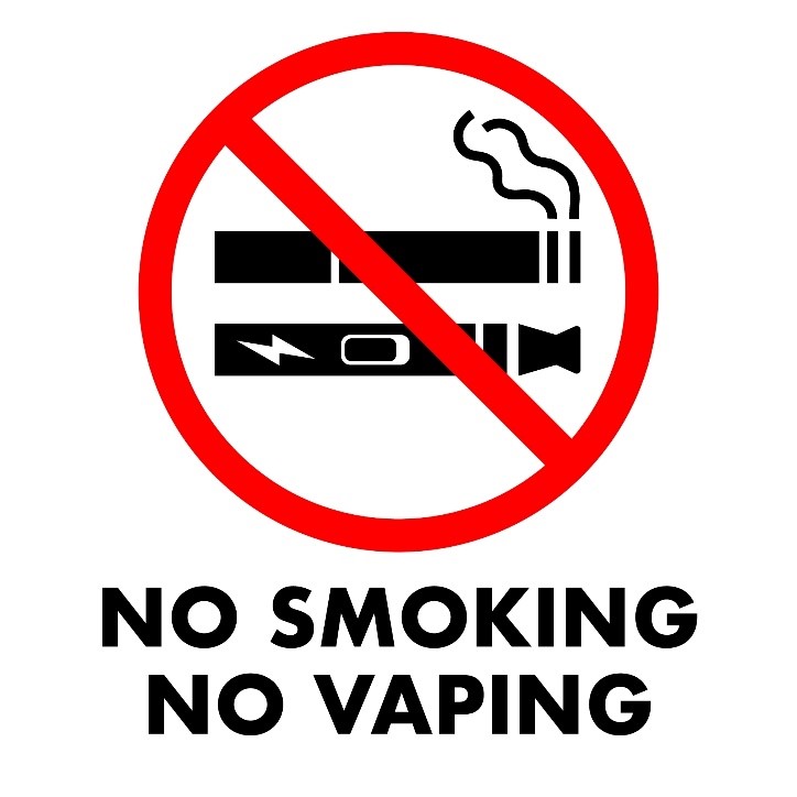an image of a white cigarette with a red circle around it and line through it, with the words “NO SMOKING NO VAPING beneath.)